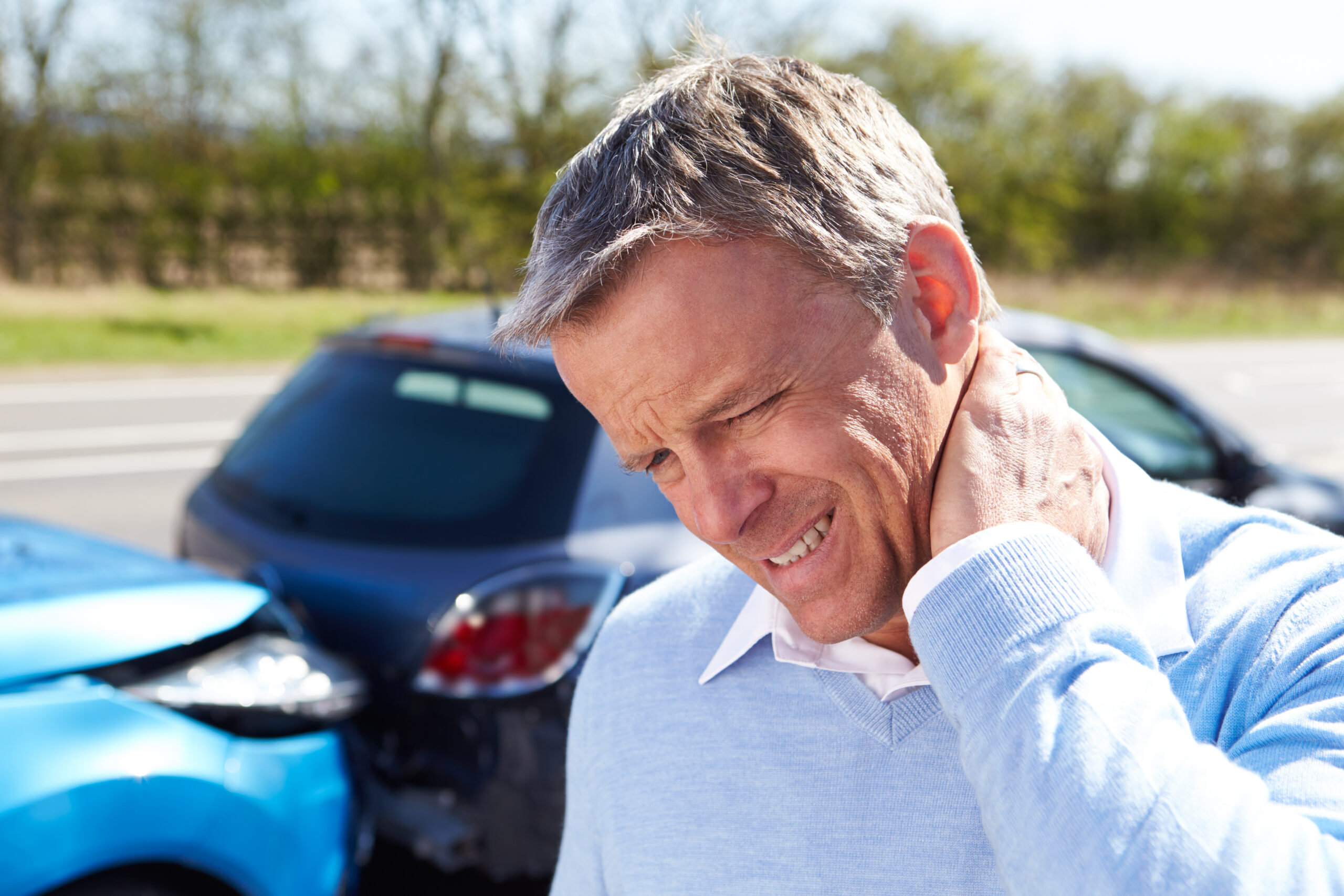 Driver,Suffering,From,Whiplash,After,Traffic,Collision